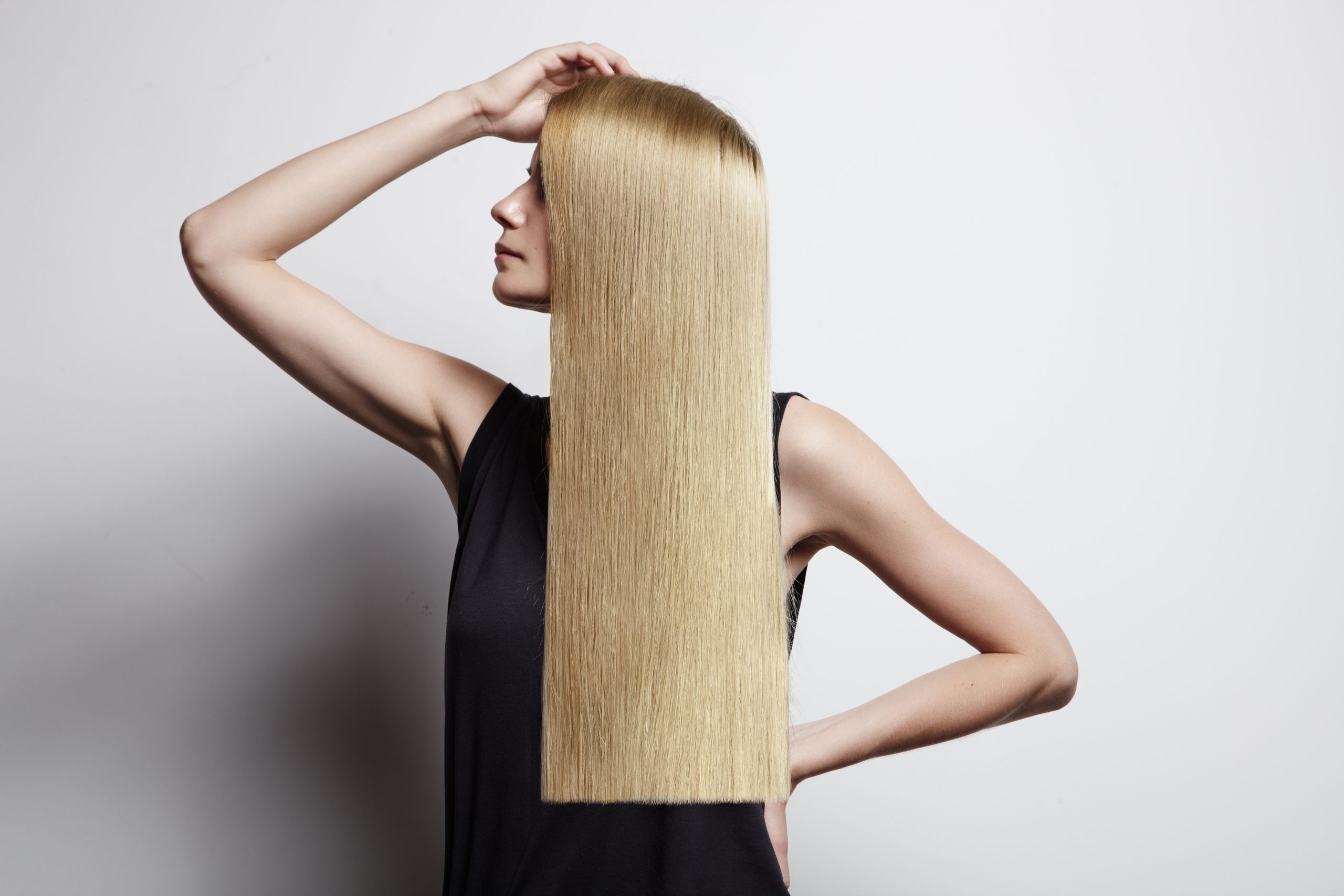blond woman showing ideal hair